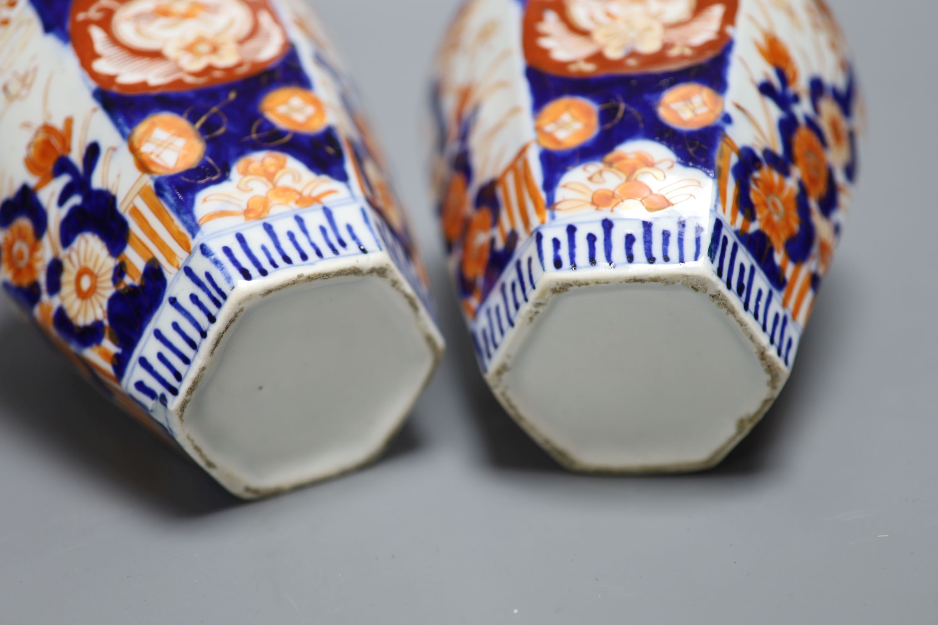 A pair of Japanese Imari vases, height 19cm